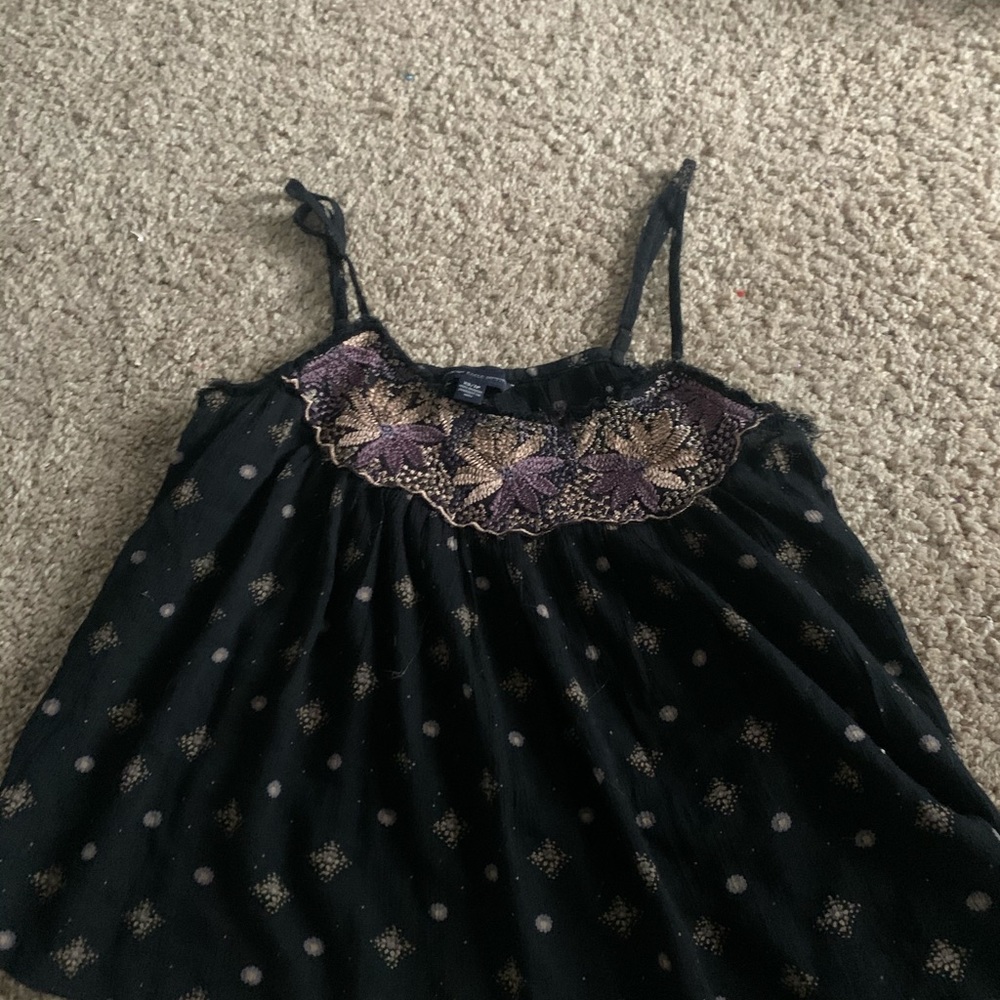 Black tank top with designs